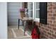 Charming front porch decor with a Welcome sign, flowers, and a bunny figurine at 2404 Gillingham Dr, Apex, NC 27539