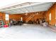 Spacious two-car garage with ample storage and workspace, perfect for car enthusiasts or DIY projects at 2404 Gillingham Dr, Apex, NC 27539