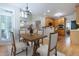 Open layout features a dining area and kitchen, perfect for modern living at 2404 Gillingham Dr, Apex, NC 27539