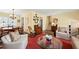 Inviting living room with hardwood floors, a comfortable seating arrangement, and stylish decor at 2415 Alpine Rd, Durham, NC 27707