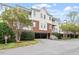 Attractive condo building with brick facade, upper balconies, and covered parking underneath at 2651 Mellow Field Dr # 206, Raleigh, NC 27604