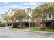 Beautiful multi-story brick and white building with well-manicured landscaping at 2651 Mellow Field Dr # 206, Raleigh, NC 27604
