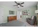 Bedroom with colorful decor, shelving, and chair creating a fun and inviting atmosphere at 2705 Evanston Ave, Durham, NC 27703