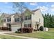 Well-maintained two-story home with attached garage, manicured lawn, and landscaping at 2705 Evanston Ave, Durham, NC 27703