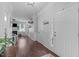 Bright foyer with hardwood floors and an open view to the living room at 2705 Evanston Ave, Durham, NC 27703
