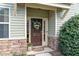 Inviting front entrance with decorative wreath and stone accents at 2705 Evanston Ave, Durham, NC 27703