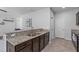 Kitchen view featuring granite countertops, stainless steel sink, and tile flooring at 2705 Evanston Ave, Durham, NC 27703