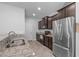 Kitchen featuring stainless steel appliances, granite countertops and tile flooring at 2705 Evanston Ave, Durham, NC 27703
