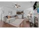 Spacious living room with a comfortable sofa, decorative rug, and open view of the kitchen at 2705 Evanston Ave, Durham, NC 27703