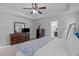 Bedroom featuring a ceiling fan, carpet floors and furniture at 2705 Evanston Ave, Durham, NC 27703