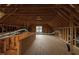 A partially finished attic space provides extra storage and expansion opportunities at 2905 Pluton Pl, Rolesville, NC 27571