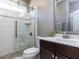 Nicely appointed bathroom featuring glass enclosed shower and decorative framed mirror at 2905 Pluton Pl, Rolesville, NC 27571