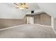 Large bonus room with ceiling fan, neutral paint, plush carpet and vaulted ceiling at 2905 Pluton Pl, Rolesville, NC 27571