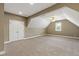 This bonus room features a ceiling fan, neutral paint and plush carpet at 2905 Pluton Pl, Rolesville, NC 27571