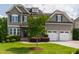 Stunning two-story home boasts an attached two-car garage and a meticulously maintained lawn at 2905 Pluton Pl, Rolesville, NC 27571