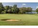 Lush green fairways and mature trees define this picturesque golf course view at 2905 Pluton Pl, Rolesville, NC 27571
