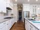 Elegant kitchen equipped with granite countertops, stainless steel appliances, and custom cabinetry at 2905 Pluton Pl, Rolesville, NC 27571