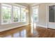 Bright room with hardwood floors, large windows, and a view to the outdoors at 2905 Pluton Pl, Rolesville, NC 27571