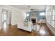 Spacious living room with fireplace, hardwood floors, and an open layout to the backyard patio at 2905 Pluton Pl, Rolesville, NC 27571