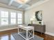 Bright office space with coffered ceiling, a desk, modern decor, and large windows at 2905 Pluton Pl, Rolesville, NC 27571