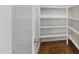Pantry with open door showing shelving at 2905 Pluton Pl, Rolesville, NC 27571
