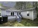 Backyard deck and patio area, perfect for entertaining, with access to the home's interior at 300 Round About Rd, Holly Springs, NC 27540