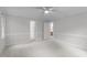 Expansive bedroom featuring neutral walls, large windows, and plush carpeting providing a serene atmosphere at 307 Parkmeadow Dr, Cary, NC 27519