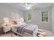 Bright bedroom with a plush rug, complemented by a comfortable bed and windows providing natural light at 307 Parkmeadow Dr, Cary, NC 27519