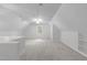 Large bonus room with carpeted floors and vaulted ceilings at 307 Parkmeadow Dr, Cary, NC 27519