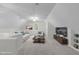 Large and bright bonus room with vaulted ceilings and a ceiling fan at 307 Parkmeadow Dr, Cary, NC 27519