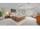 Well-lit main bedroom features a ceiling fan and lots of natural light at 307 Parkmeadow Dr, Cary, NC 27519