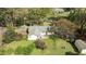 Aerial view of the house and backyard including a nice patio area at 310 Edward Ln, Louisburg, NC 27549