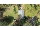A bird's-eye view showcases a well-kept yard and landscaping surrounding the home at 310 Edward Ln, Louisburg, NC 27549