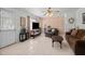 Inviting living room with large windows and cozy furnishings at 310 Edward Ln, Louisburg, NC 27549