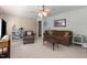Comfortable living room featuring tile flooring and neutral colors at 310 Edward Ln, Louisburg, NC 27549
