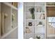 Elegant built-in bookcase offering ample storage and display space next to a bright window at 315 Greenwood Dr, Durham, NC 27704