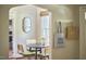 Cozy dining area with a round table, chairs, and natural light from the window creates a welcoming space at 315 Greenwood Dr, Durham, NC 27704