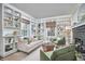 Cozy living area features built-in bookshelves, a fireplace, and comfortable seating for relaxation at 315 Greenwood Dr, Durham, NC 27704