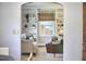 Stylish living room with comfortable seating, built-in bookshelves, and natural light, perfect for relaxing or entertaining at 315 Greenwood Dr, Durham, NC 27704