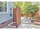 Charming outdoor shower area with stone pavers at 315 Greenwood Dr, Durham, NC 27704