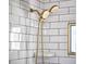 Shower detail showing double shower heads and white tiled walls create a spa-like feel in the bathroom at 315 Greenwood Dr, Durham, NC 27704