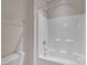 Full bathroom featuring a shower and bathtub combo with white walls, and fixtures, as well as a toilet at 318 Acorn Hollow Pl, Durham, NC 27703