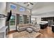 Bright living room with vaulted ceilings, ample natural light, and an open-concept design to the kitchen at 318 Acorn Hollow Pl, Durham, NC 27703