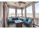 Relax on the screened porch with stylish furniture and neighborhood views at 3262 Ripley River Rd, New Hill, NC 27562