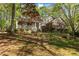 Beautiful brick home with covered porch and well-maintained landscaping at 3417 Windmere Dr, Sanford, NC 27330