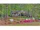 Charming brick home with a welcoming front porch and mature trees at 3417 Windmere Dr, Sanford, NC 27330