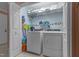 Well-equipped laundry room featuring a modern washer and dryer set with ample storage at 3417 Windmere Dr, Sanford, NC 27330