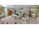Spacious main bedroom with light green walls and comfortable seating area at 3417 Windmere Dr, Sanford, NC 27330