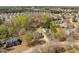 Beautiful neighborhood aerial view with mature trees and sidewalks near parks and schools at 3908 Yateswood Ct, Raleigh, NC 27603