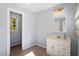 Bright bathroom with vanity and doorway to additional room at 3908 Yateswood Ct, Raleigh, NC 27603